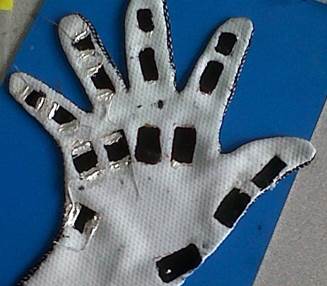 Naguib_Smart-textile-sensing-glove_Nov2014
